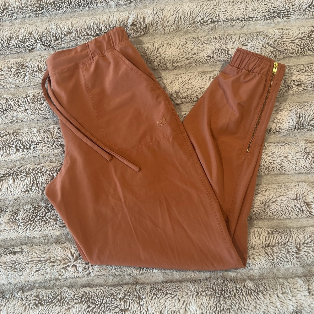 Albion Fit Rouge (salmon) color Jetsetters size XS